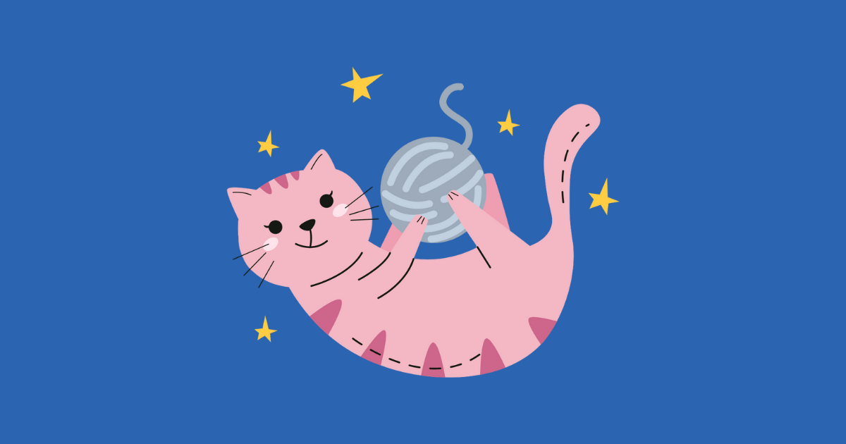 毛糸を抱くねこの画像